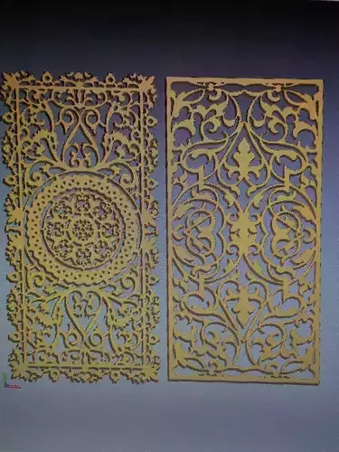 decor two gold carved panels on table