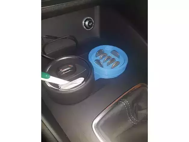 Cup holder wastebin and coinholder