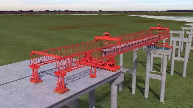 settled bridge over river in middle of field