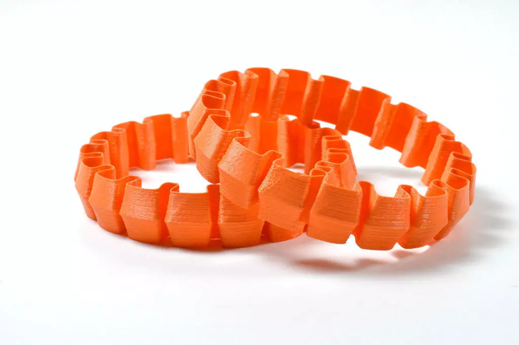 Stretchlet two orange plastic bracelets Free 3D print model