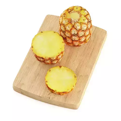 Pineapple cut on wooden cutting board
