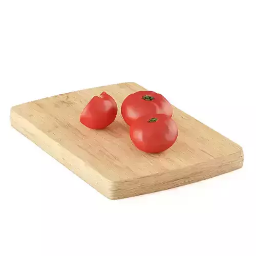 Tomatoes three on wooden cutting board