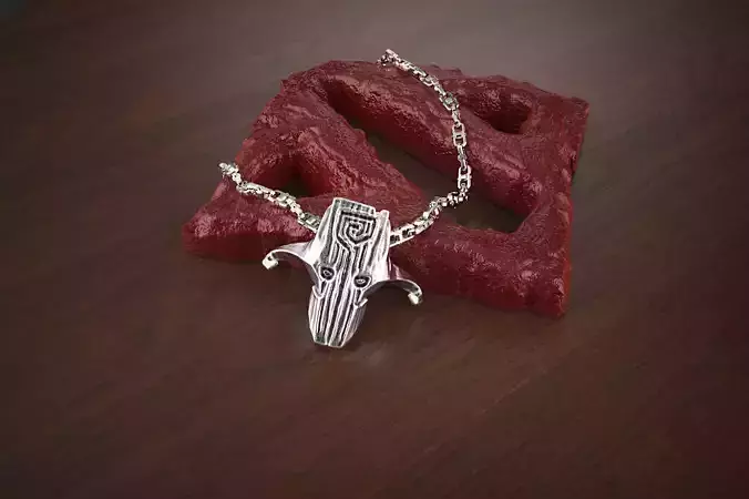 jewelry silver pendant on wooden table