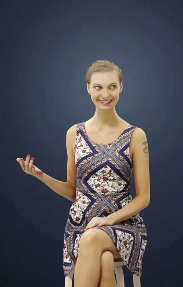 Aspiration A Caucasian Female Sitting In A Cafe smiling 3D model_0