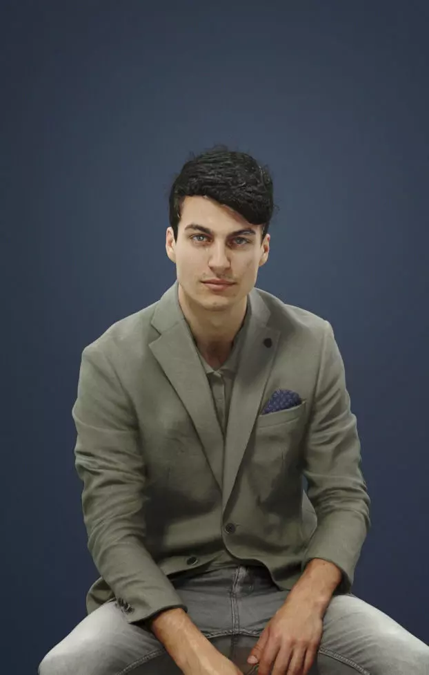 Prime Smart Casual Man In Green Jacket Sitting And Observing 3D model_0