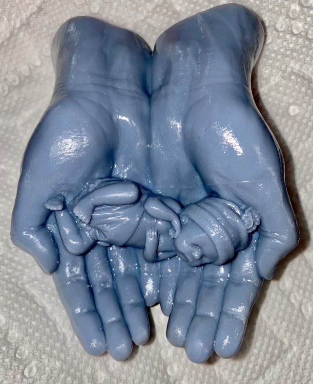 hands carrying sleeping baby 3D print model_37