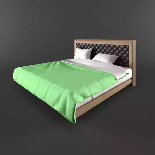 Bed with green blanket