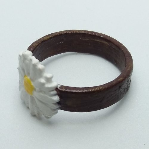 Ring with embossed and overflowing daisy 3D print model