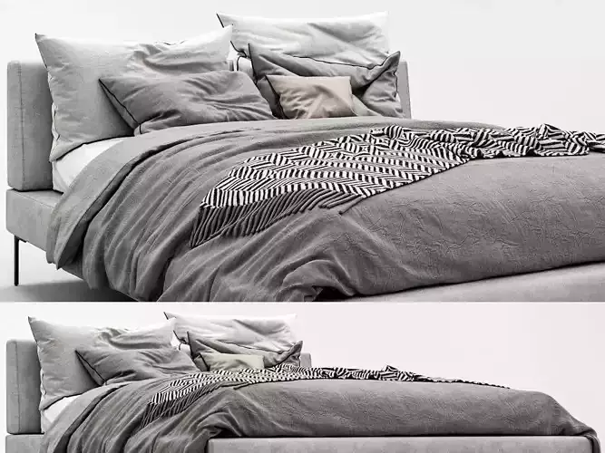 Charles B bed with linens and pillows