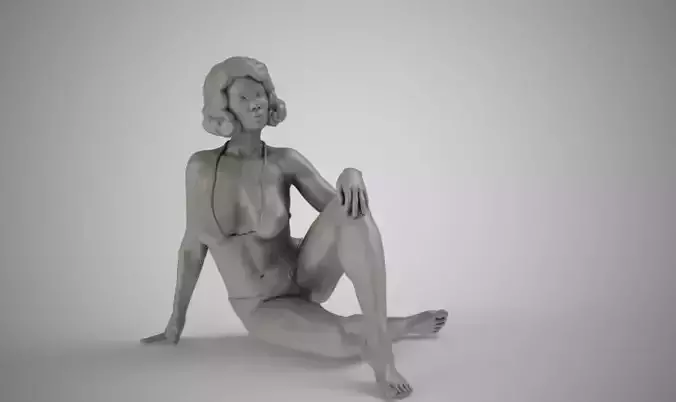 Pretty Woman Sitting on the Floor