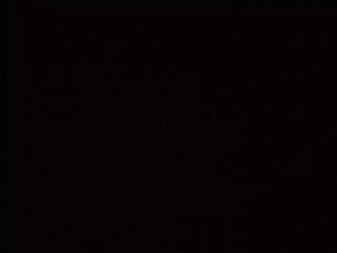 Azerty plane flying in sky at night