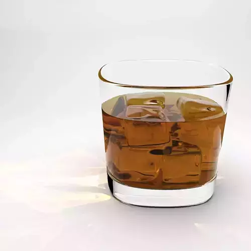 Whisky glass with liquid and ice cubes 3D model