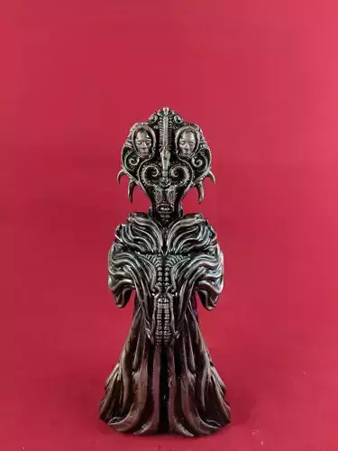 Priest metal statue of person