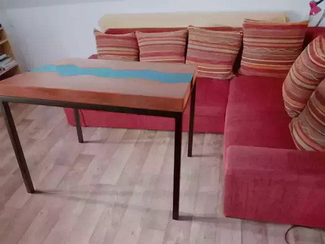 Decorative wooden table with a river inside