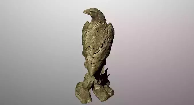 Statue of a standing eagle on a rocklike base
