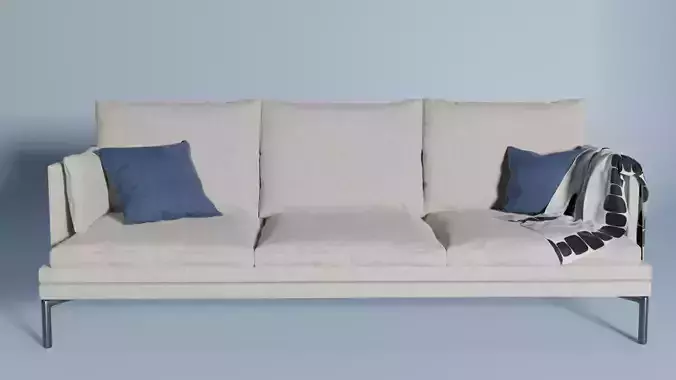 White couch with blue pillows