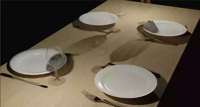 Table with cutlery and plates and wine glasses