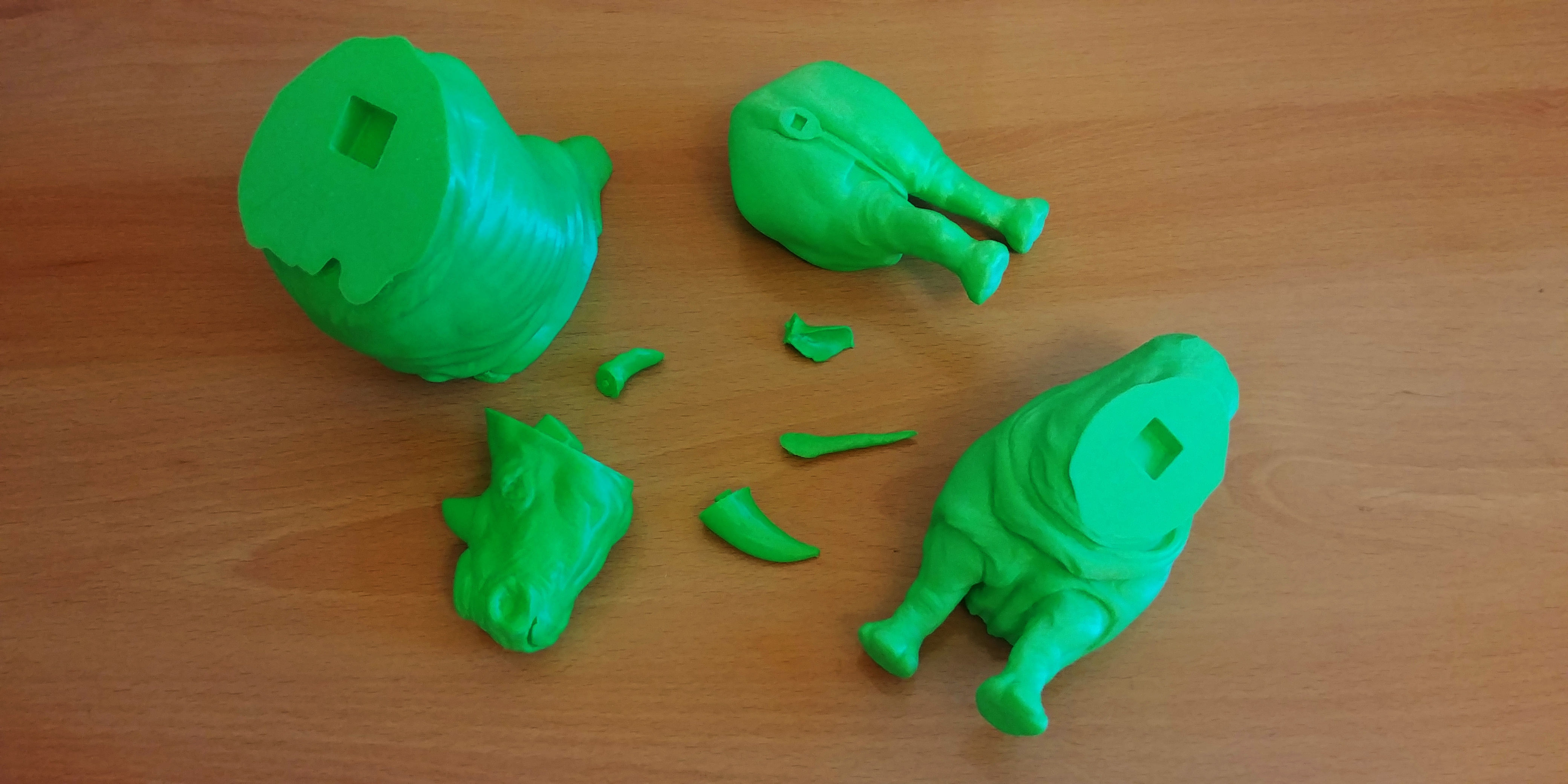 Rhinoceros plastic toy on wooden table 3D print model_9
