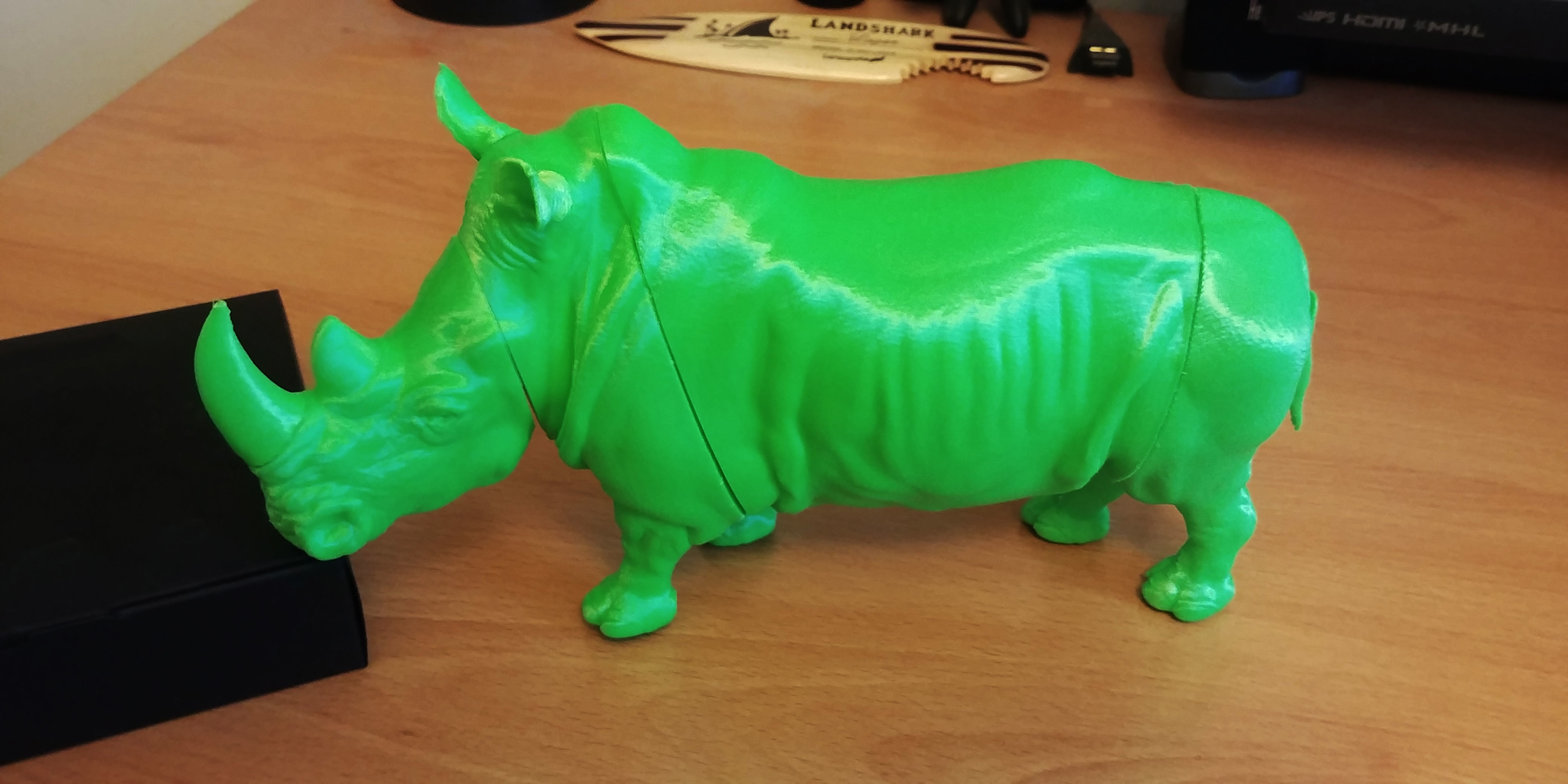 Rhinoceros plastic toy on wooden table 3D print model_10