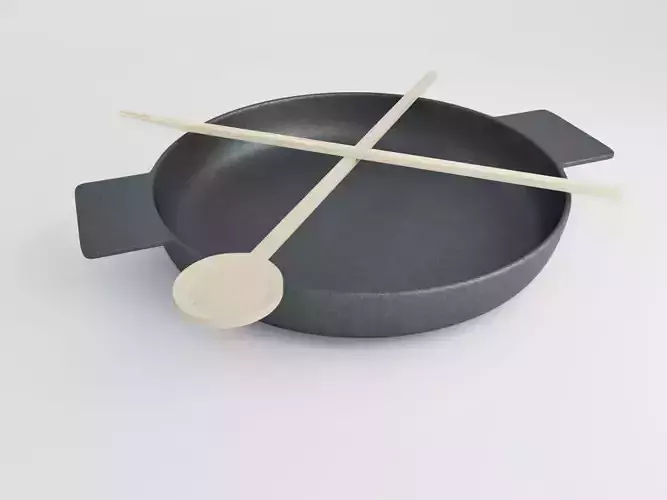 Stylish pan with set of cutlery