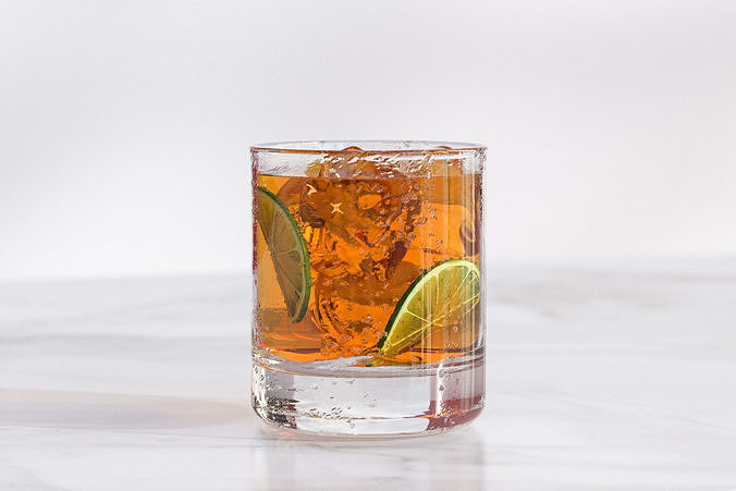 A glass of tea with lime slice nad ice cubes 3D model