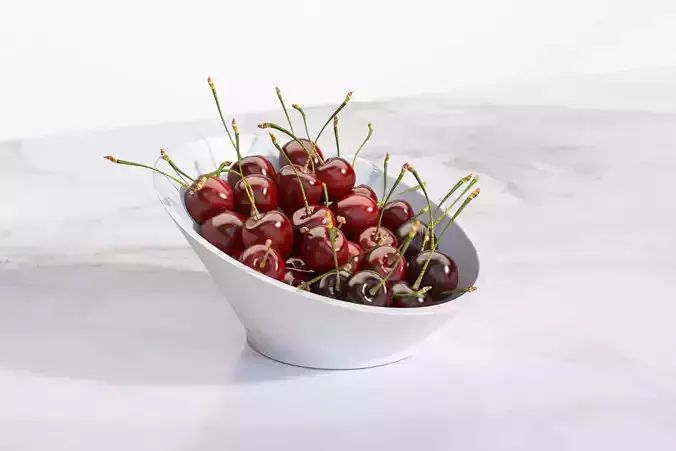 Cherries in a white porcelain bowl
