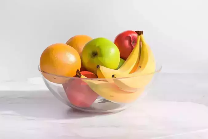 Fruit in a transparent glass bowl
