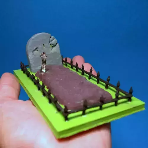 hand coming out of a grave 3D print model