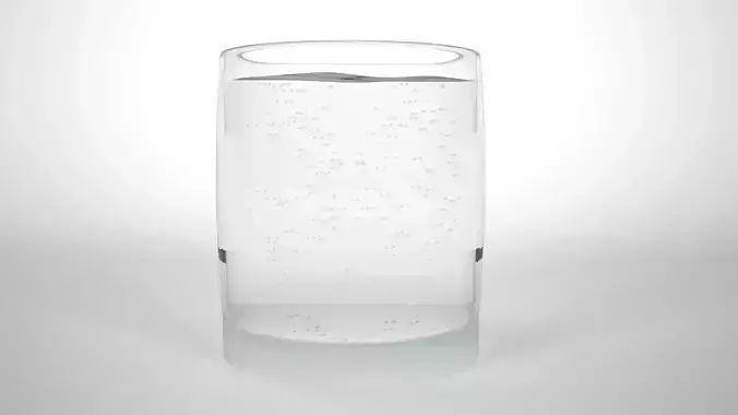 Glass of water with bubbles in it
