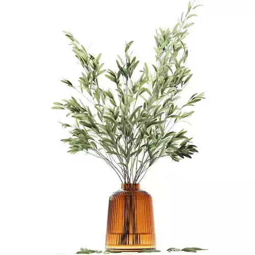 Olive stems in yellow glass vase with water