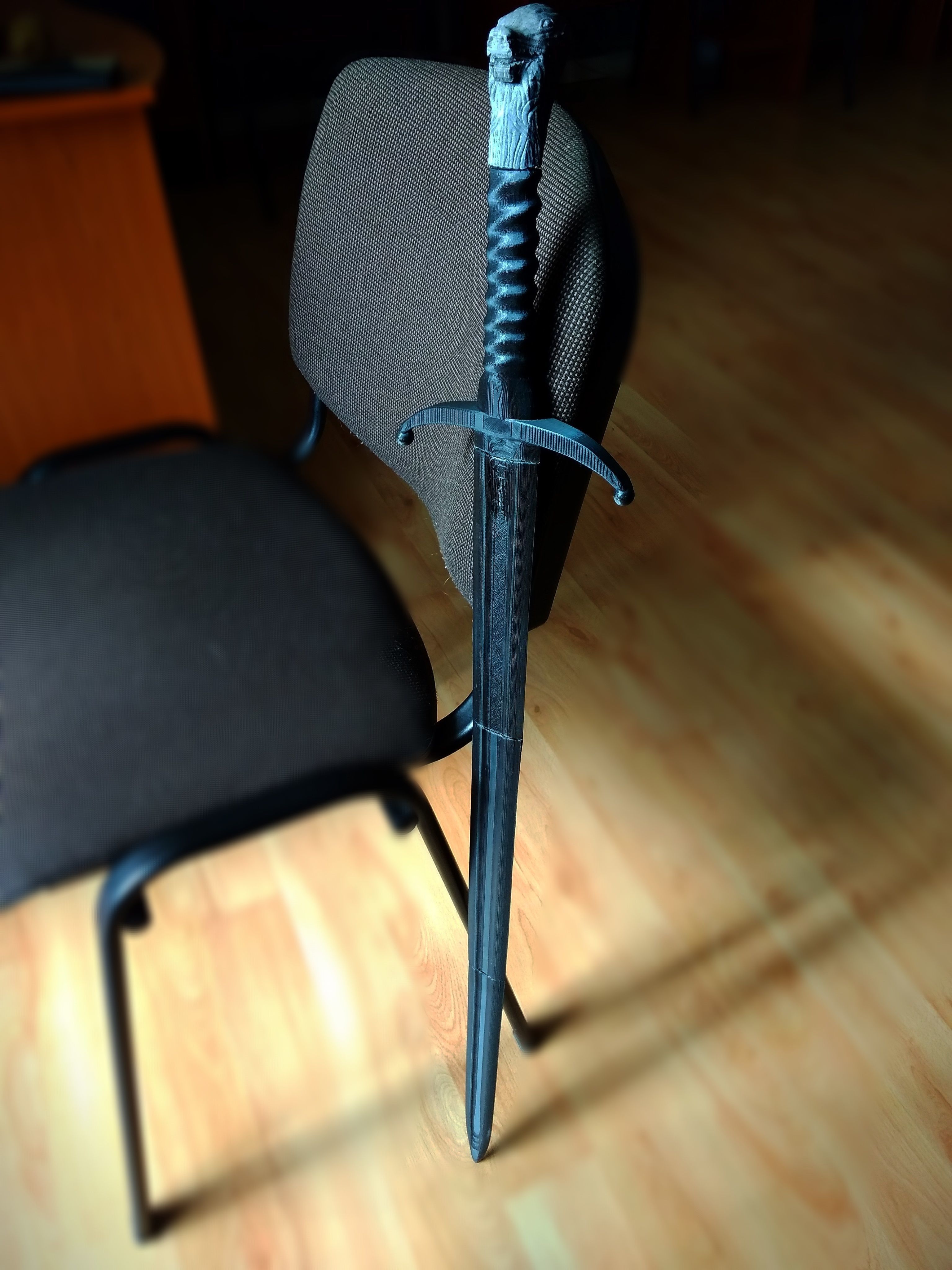 Longclaw sword in hands of person 3D print model_2