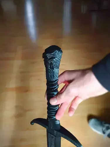 Longclaw sword in hands of person 3D print model