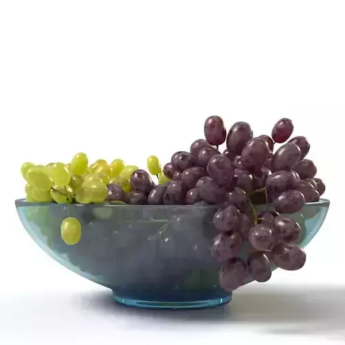 Bunches of grapes in a glass bowl