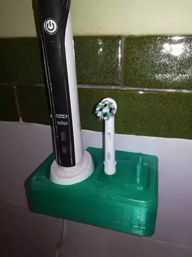 TOOTHBRUSH AND CHARGER HOLDER
