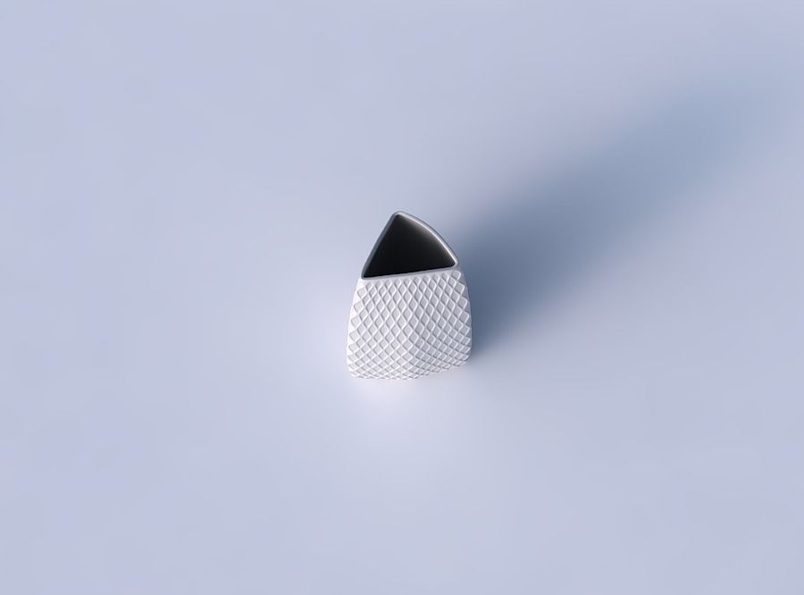 Vase curved tipping triangle with diagonal grid dents 3D print model_2