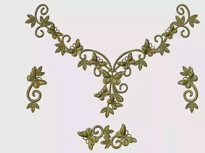 gold set necklace with leaves and vines