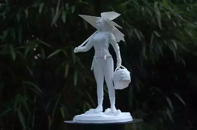 FRAGILE sculpture of woman holding umbrella