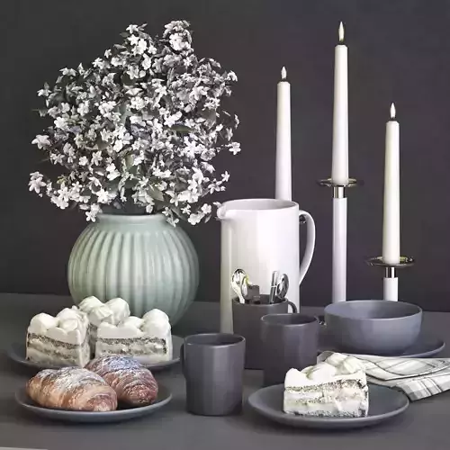 A set of dishes with a croissant and cake 3D model