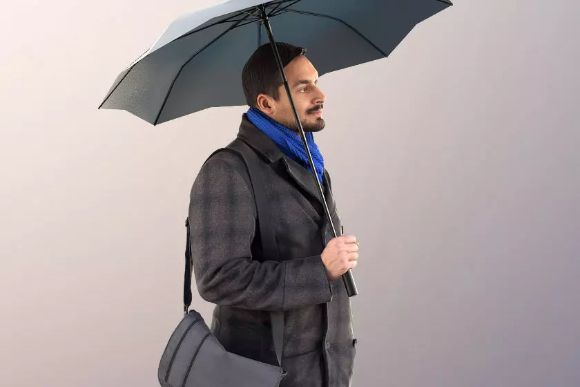 Sahir 11009 - Guy Walking with Umbrella Low-poly 3D model_0