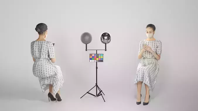 Sitting attractive lady in a dress and mask 186