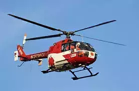 BO-105 helicopter flying in sky Free low-poly 3D model