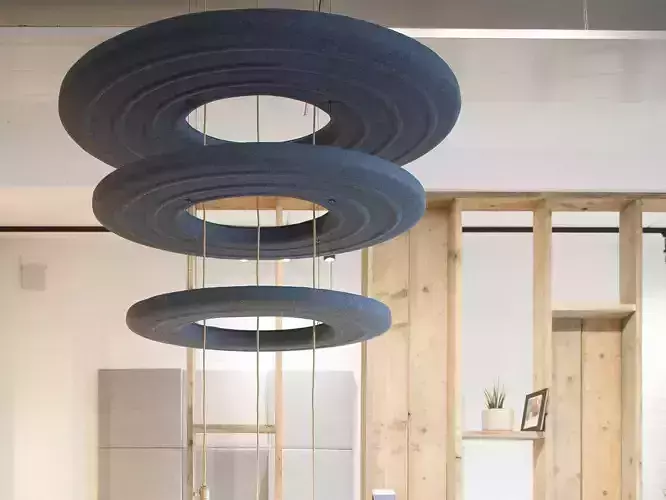 BUZZIDONUT pendant light with three circles hanging from it