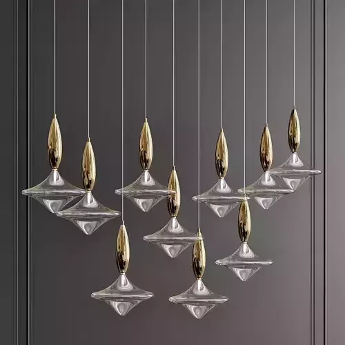 ETOILE group of gold and glass pendants hanging from wall