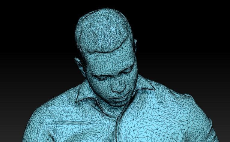 Cute young man in suit is sitting and reading documents 180 Low-poly 3D model_4