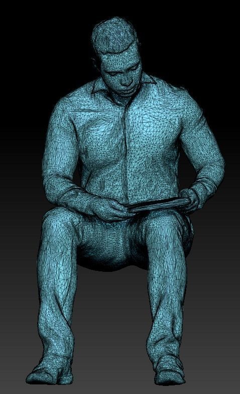 Cute young man in suit is sitting and reading documents 180 Low-poly 3D model_5