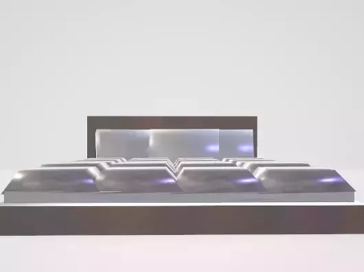 Bed With Purple Quilt