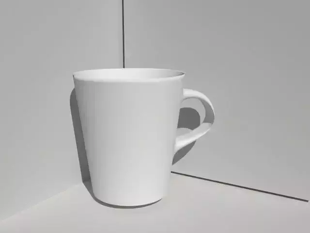 Glass coffee cup on wall
