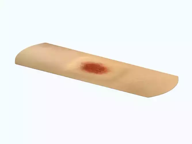 Dirty used sticking plaster with blood spot