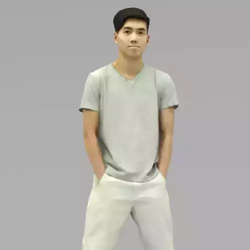 A Young Man Posing with Hands in Pockets In Half Body Portrait