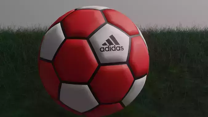 Red football on grass
